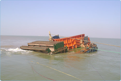 Re-floating the sunken barge