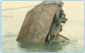 Barge on the sea bed in toppled (upside down) condition